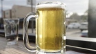 A mug of beer sits on the counter at a bar in the Ocean Beach neighborhood of San Diego, California, U.S., on Monday, June 29, 2020. Bars are required to shut in seven counties -- including Los Angeles -- and they're recommended to close in eight others, including Sacramento and Santa Barbara, following a surge in coronavirus cases, according to an order by Governor Gavin Newsom on Sunday. Photographer: Bing Guan/Bloomberg