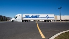 A Wal-Mart Stores Inc. truck sits parked in front of the company's fulfillment center in Bethlehem, Pennsylvania, U.S., on Wednesday, March 29, 2017. Wal-Mart Stores Inc. acquired e-commerce startup Jet.com for $3.3 billion in cash and stock. Jet.com Founder and his management team were put in charge of Wal-Mart's entire domestic e-commerce operation, overseeing more than 15,000 employees in Silicon Valley, Boston, Omaha, and its home office in Arkansas. Photographer: Michael Nagle/Bloomberg