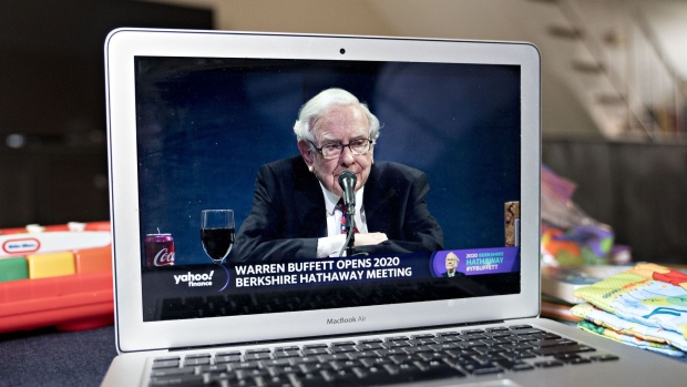 Warren Buffett, chairman and chief executive officer of Berkshire Hathaway Inc., speaks during the virtual Berkshire Hathaway annual shareholders meeting seen on a laptop computer in Arlington, Virginia, U.S., on Saturday, May 2, 2020. Buffett, hosting the annual meeting virtually, has largely stayed in the shadows as the coronavirus pandemic hammered the global economy and stock markets. Photographer: Andrew Harrer/Bloomberg