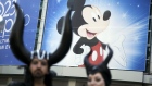 Mickey Mouse signage is displayed outside the D23 Expo 2017 in Anaheim, California, U.S., on Friday, July 14, 2017. Burbank, California-based Disney will entertain D23 guests this weekend with sneak previews of movies as well as the opportunity to purchase exclusive merchandise at dozens of shops situated in the Anaheim Convention Center. Photographer: Patrick T. Fallon/Bloomberg