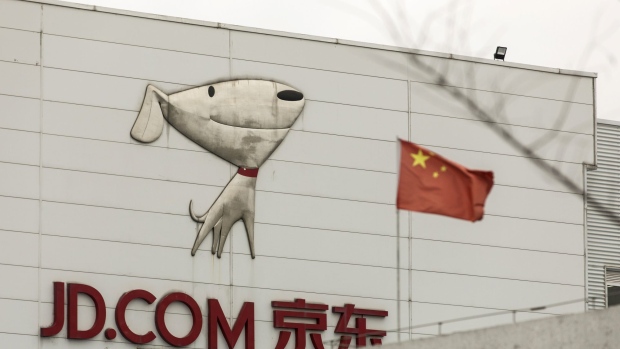 Signage is displayed at JD.com Inc.'s Asia No. 1 Shanghai Jading Logistics Park facility in Shanghai, China, on Sunday, March 1, 2020. JD.Com is scheduled to release fourth-quarter earnings results on March 2. Photographer: Qilai Shen/Bloomberg