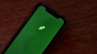The logo for Robinhood is displayed on a smartphone in an arranged photograph taken in the Brooklyn borough of New York, U.S., on Monday, Oct. 12, 2020. Even though the firm said this year that it has more than doubled its customer-service team, clients complain they're struggling to get quick help when their funds are disappearing.