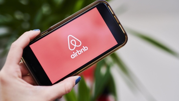 AirBnb Inc. signage is displayed on an smartphone in an arranged photograph taken in the Brooklyn borough of New York, U.S., on Friday, April 17, 2020.