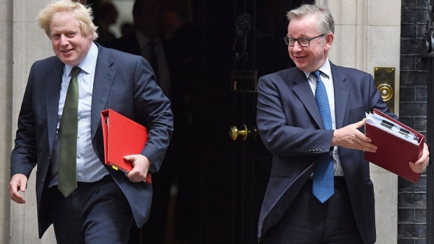 LONDON, ENGLAND - JUNE 15: Foreign Secretary Boris Johnson and Environment Secretary Michael Gove leave 10 Downing Street on June 15, 2017 in London, England. Prime Minister Theresa May is due to hold a series of meetings with the main Northern Ireland political parties today to allay mounting concerns over a government deal with the DUP in the wake of the UK general election. (Photo by Chris J Ratcliffe/Getty Images)