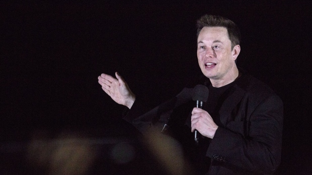 Elon Musk, chief executive officer of Space Exploration Technologies Corp. (SpaceX) and Tesla Inc., speaks during an event at the SpaceX launch facility in Cameron County, Texas, U.S., on Saturday, Sept. 28, 2019. Musk gave space fans an update Saturday evening on the status of "Starship," the next-generation vehicle his SpaceX plans to use to eventually take humans to Mars. Photographer: Bronte Wittpenn/Bloomberg