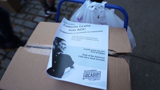 NEW YORK, NEW YORK - OCTOBER 27: A flyer announcing a food distribution event sits on a box of a community member on October 27, 2020 in New York City. Rep. Alexandria Ocasio-Cortez (D-NY), New York state Assemblywoman Catalina Cruz, State Sen. Jessica Ramos, and Assembly District 34 candidate Jessica Gonzalez-Rojas, along with representatives from Make the Road NY helped to distribute food to families in Queens affected by economic distress due to the coronavirus (COVID-19) pandemic. (Photo by Michael M. Santiago/Getty Images)