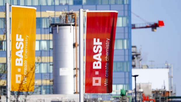 The BASF SE logo sits on banners flying outside the company's headquarters in Ludwigshafen, Germany, on Friday, Feb, 28, 2020. The chemical industry became the latest sector to be hit by the coronavirus after German giant BASF warned the outbreak could lead to the lowest growth in production since the financial crisis more than a decade ago. Photographer: Alex Kraus/Bloomberg