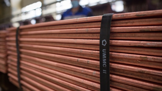 Branded binding secures newly-made copper cathode sheets in the electrolysis shop at the Uralelectromed Copper Refinery, operated by Ural Mining and Metallurgical Co. (UMMC), in Verkhnyaya Pyshma, Russia, on Thursday, July 30, 2020. Gold surged to a fresh record Friday fueled by a weaker dollar and low interest rates. Silver headed for its best month since 1979. Photographer: Andrey Rudakov/Bloomberg