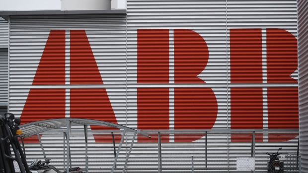A logo stands on the exterior of an ABB Ltd. plant in Baden, Switzerland, on Monday, Dec. 17, 2018. Hitachi Ltd.'s planned takeover of ABB's power grid division for about $6.4 billion will be the Japanese conglomerate's biggest-ever deal as it shifts focus from nuclear plants to the higher-growth market for electricity networks. Photographer: Stefan Wermuth/Bloomberg