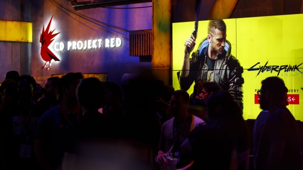 CD Projekt Red SA Cyberpunk 2077 video game signage is displayed as attendees wait for a demonstration during the E3 Electronic Entertainment Expo in Los Angeles, California, U.S., on Wednesday, June 12, 2019. For three days, leading-edge companies, groundbreaking new technologies and never-before-seen products are showcased at E3. Photographer: Patrick T. Fallon/Bloomberg