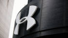 Signage is displayed outside an Under Armour Inc. store on Michigan Avenue in Chicago, Illinois, U.S., on Tuesday, Feb. 11, 2020. Under Armour said its 2020 revenue would fall by a low-single-digit percentage and earnings for the year would be 10 cents to 13 cents a share, far below analysts' estimates as compiled by Bloomberg. Photographer: Taylor Glascock/Bloomberg