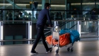LONDON, ENGLAND - AUGUST 22: Travellers exit Heathrow Airport Terminal 2 on August 22, 2020 in London, England. As of Saturday morning at 4am, travellers arriving in England from Austria, Croatia, and Trinidad and Tobago were required to quarantine themselves for 14 days. At the same time, travellers from Portugal were no longer required to quarantine. (Photo by Hollie Adams/Getty Images) Photographer: Hollie Adams/Getty Images Europe