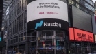 Airbnb Inc. signage on an electronic monitor during the company's initial public offering (IPO) at the Nasdaq MarketSite in New York, U.S., on Thursday, Dec. 10, 2020. Airbnb Inc. priced its long-awaited initial public offering above a marketed range to raise about $3.5 billion, seizing on investor demand for a home-rental business roaring back from a pandemic-fueled slump.