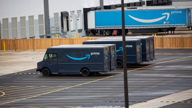 Amazon and trailers are parked outside of a delivery station. Photographer: Michael Nagle/Bloomberg