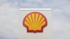 A Shell logo sits on a sign at a gas station, operated by Royal Dutch Shell Plc., in Rotterdam, Netherlands, on Wednesday, July 25, 2018. Shell is scheduled to release earnings figures on July 26. Photographer: Jasper Juinen/Bloomberg