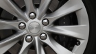 The Tesla Inc. logo sits on the wheel hub of a Tesla Model S electric automobile at the Nextmove headquarters in Leipzig, Germany, on Thursday, Aug. 15, 2019. In Europe, Tesla is racing against time as more established players wake up to the electric future.