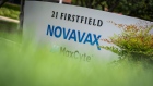 Signage is displayed outside the Novavax Inc. headquarters in Gaithersburg, Maryland, U.S., on Saturday, Aug. 8, 2020. Novavax shares last week touched a five-year high as investors assessed early data on its experimental vaccine for Covid-19. Photographer: Sarah Silbiger/Bloomberg