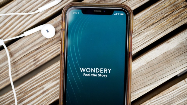 The logo for Wondery is displayed on a smartphone in an arranged photograph taken in the Brooklyn borough of New York, U.S., on Tuesday, Sept. 29, 2020. Wondery Inc. is expected to garner at least $200 million if it pursues a sale and could fetch as much as double that, which would represent the biggest podcasting transaction to date, according to people familiar with the matter. Photographer: Gabby Jones/Bloomberg