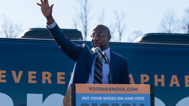 Raphael Warnock, U.S. Democratic Senate candidate, speaks during a campaign event in Riverdale, Georgia, U.S., on Monday, Jan. 4, 2021. President Donald Trump and President-elect Joe Biden will each make last-minute campaign appearances in Georgia for candidates in two runoff elections that will decide whether Republicans retain control of the U.S. Senate.