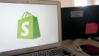 The Shopify Inc. logo is displayed on a laptop computer in an arranged photograph taken in Arlington, Virginia.