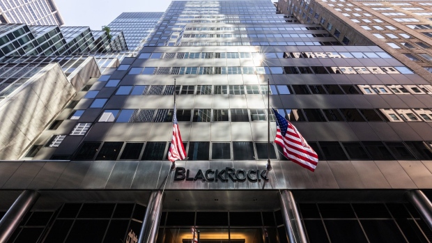 American flags fly at the entrance to BlackRock Inc. headquarters in New York, U.S, on on Thursday, July 9, 2020. BlackRock is scheduled to release earnings figures on July 17.
