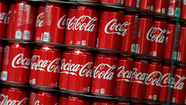 Cans of Coca-Cola Co. brand soda sit on display at the Swire Coca-Cola bottling plant in West Valley City, Utah, U.S., on Friday, April 19, 2019. The Coca-Cola Co. is scheduled to release earnings figures on April 23.