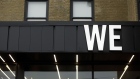 Signage is displayed outside a WE Charity office in Toronto, Ontario, Canada, on Wednesday, Sept. 9, 2020. WE Charity says it is closing its Canadian operations, blaming Covid-19 and the political fallout from the Liberal government's plan to have it run a multimillion-dollar student-volunteer program, Canadian Press reports.