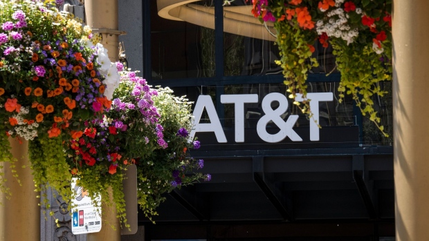 AT&T Inc. signage is displayed on a store in San Francisco, California, U.S., on Tuesday, July 21, 2020. AT&T is expected to release earnings figures on July 23. Photographer: David Paul Morris/Bloomberg