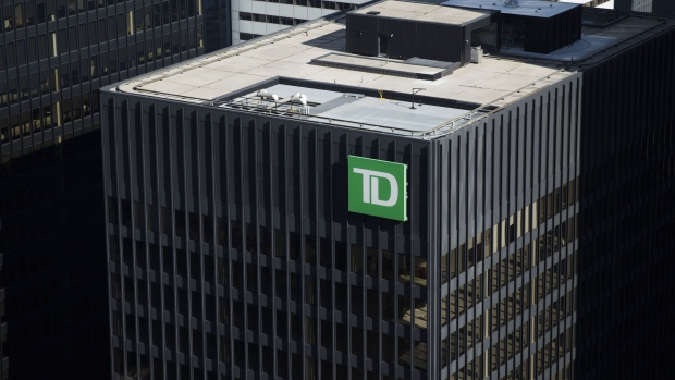 The Toronto-Dominion Bank (TD) headquarters stands in the financial district of Toronto, Ontario, Canada, on Wednesday, July 11, 2018. Canadian stocks were mixed Friday as health care tumbled and energy rose, even as was still on pace for a weekly loss amid escalating trade war risks. Photographer: Brent Lewin/Bloomberg