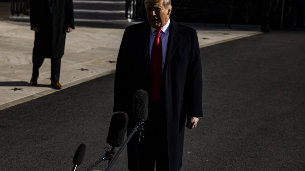 Donald Trump speaks to members of the media while departing the White House in Washington, D.C. on Jan. 12. Photographer: Samuel Corum/Bloomberg