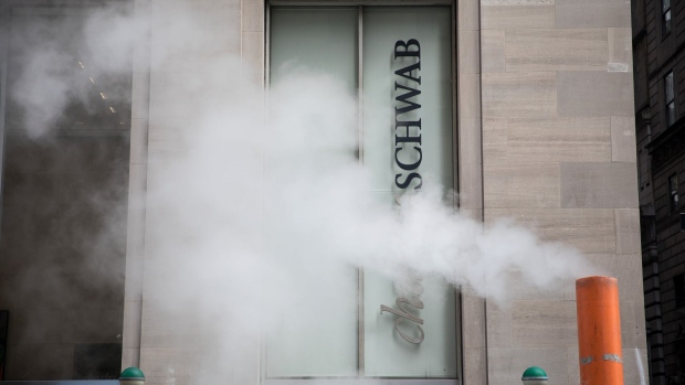 Steam rises in front of a Charles Schwab Corp. location in New York, U.S., on Monday, Oct. 14, 2019. Charles Schwab is scheduled to release earnings figures on October 15. Photographer: Michael Nagle/Bloomberg