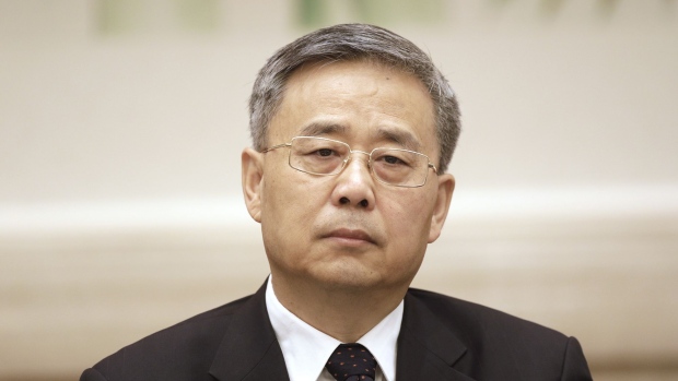 Guo Shuqing, chairman of the China Banking Regulatory Commission, attends a news conference at the Great Hall of the People during the 19th National Congress of the Communist Party of China in Beijing, China, on Thursday, Oct. 19, 2017. Communist Party leaders are gathering in Beijing this week to map policy for the next five years, with President Xi Jinping telling delegates that China is transitioning from a rapid growth model to one more focused on high-quality development.