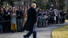 WASHINGTON, DC - JANUARY 12: U.S. President Donald Trump looks toward staff and supporters as he walks toward Marine One on the South Lawn of the White House on January 12, 2021 in Washington, DC. Following last week's deadly pro-Trump riot at the U.S. Capitol, President Trump is making his first public appearance with a trip to the town of Alamo, Texas to view the construction of the wall along the U.S.-Mexico border. (Photo by Drew Angerer/Getty Images)