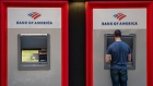 A person uses an automated teller machine (ATM) outside a Bank of America branch in San Francisco, California, U.S., on Thursday, Jan. 14, 2021. Bank of America Corp. is expected to release earnings figures on January 19.