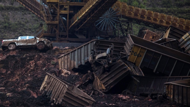 Bloomberg Best of the Year 2019: A pick up truck sits among shattered debris after a dam breach at the Vale SA iron ore mine in Brumadinho, Minas Gerais state, Brazil, on Saturday, Jan. 26, 2019.
