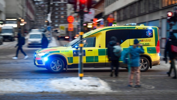 An ambulance in the city center of Stockholm, Sweden, on Monday, Jan. 18, 2021. Sweden's Prime Minister Stefan Lofven has said he can’t rule out further restrictions under a temporary new law to combat the spread of the coronavirus pandemic. Photographer: Mikael Sjoberg/Bloomberg