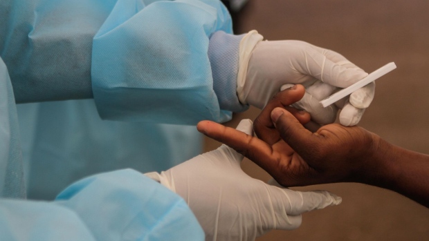 HARARE, ZIMBABWE - JANUARY 22: A Rapid Diagnosis Test is conducted at Lancet Clinical Laboratories, a Covid-19 testing facility at St Annes Hospital on January 22, 2021 in Harare, Zimbabwe. The country has seen a surge in covid-19 cases and deaths since December. (Photo by Tafadzwa Ufumeli/Getty Images)
