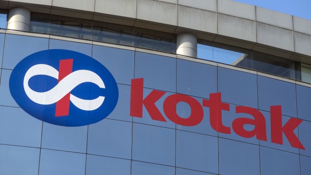 Kotak Mahindra Bank Ltd. logo is displayed at the company's head office at the Bandra Kurla Complex in Mumbai, India, on Sunday, Jan. 28, 2018. India's economy is expected to grow at 6.75 percent this year on the back of a recovery in second half of the year, Chief Economic Adviser Arvind Subramanian said in the Economic Survey presented in Parliament on Nov. 29. Photographer: Dhiraj Singh/Bloomberg