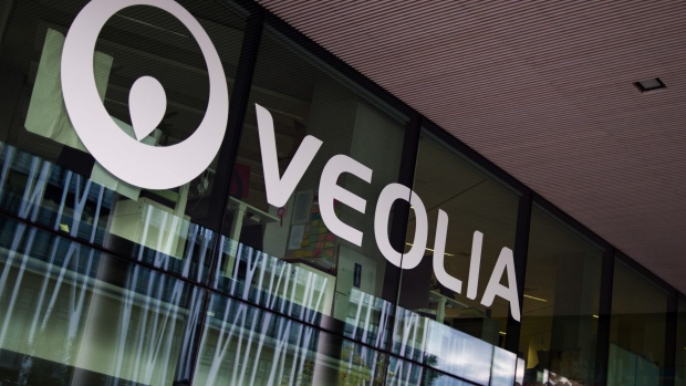 A company logo sits on display at the Veolia Environnement SA headquarters in Paris, France, on Wednesday, Sept. 30, 2020. Engie SA got five more days to consider Veolia Environnement SA’s 3.4 billion-euro bid ($4 billion) for most of its stake in Suez SA, prolonging a corporate fight in the hope of making it less hostile.