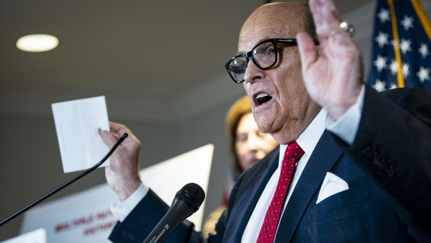 Rudy Giuliani, personal lawyer to U.S. President Donald Trump, speaks during a news conference at the Republican National Committee headquarters in Washington, D.C., U.S., on Thursday, Nov. 19, 2020. President Donald Trump’s campaign revised a pivotal Pennsylvania lawsuit seeking to block certification of the state’s election results, adding a proposal that the Republican-controlled state legislature choose the winner instead of voters.