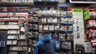 A customer browses merchandise at a GameStop store in Chicago. Photographer: Christopher Dilts/Bloomberg