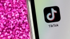 The button for ByteDance Ltd.'s TikTok app is arranged for a photograph on a smartphone in Sydney, New South Wales, Australia, on Monday, Sept. 14, 2020. Oracle Corp. is the winning bidder for a deal with TikTok’s U.S. operations, people familiar with the talks said, after main rival Microsoft Corp. announced its offer for the video app was rejected. Photographer: Brent Lewin/Bloomberg