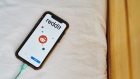 Reddit Inc. signage is displayed on a smartphone in an arranged photograph taken in the Brooklyn borough of New York.