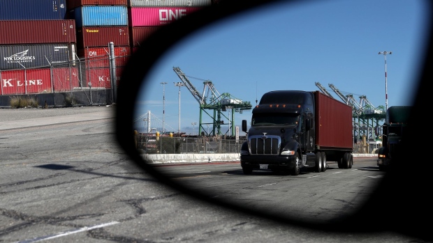 OAKLAND, CALIFORNIA - SEPTEMBER 03: A truck loaded with a shipping container drives through the Port of Oakland on September 03, 2019 in Oakland, California. The Dow Jones Industrial Average fell nearly 300 points on Tuesday as the United States imposed 15% tariffs on some Chinese goods this past Sunday and China also imposed new charges on products from the United States. (Photo by Justin Sullivan/Getty Images) Photographer: Justin Sullivan/Getty Images North America