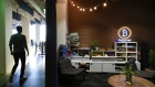 A Bitcoin neon sign is displayed in a lounge area at the Coinbase Inc. office in San Francisco.