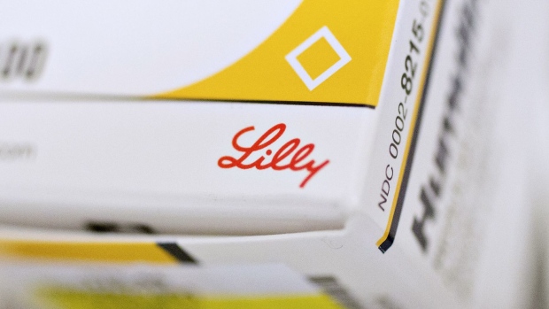 An Eli Lilly & Co. logo is seen on a box of Humulin brand insulin medication in this arranged photograph at a pharmacy in Princeton, Illinois, U.S., on Monday, Oct. 23, 2017. Eli Lilly is scheduled to release earnings figures on October 24. Photographer: Daniel Acker/Bloomberg