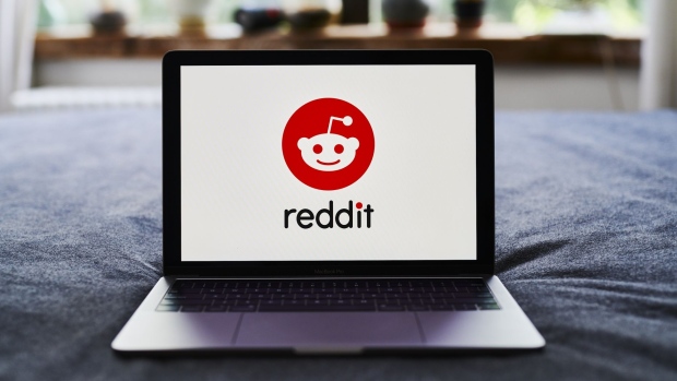 Reddit Inc. signage is displayed on a laptop computer in an arranged photograph taken in the Brooklyn borough of New York, U.S., on Tuesday, June 30, 2020. Twitch and Reddit Inc. banned content linked to President Donald Trump for violating their rules against encouraging hate. Photographer: Gabby Jones/Bloomberg