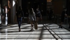 Shoppers walk through the International Plaza and Bay Street Mall in Tampa, Florida. Photographer: Eve Edelheit/Bloomberg
