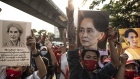 Demonstrators hold up images of Aung San Suu Kyi during a protest outside the Embassy of Myanmar in Bangkok, Thailand, on Monday, Feb. 1 2021. Myanmar's military detained Suu Kyi, declared a state of emergency and seized power for a year after disputing her party’s landslide November election victory in a setback for the country's nascent transition to democracy.
