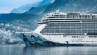 The Norwegian Cruise Line Holdings Ltd. Norwegian Bliss cruise ship passes through John Hopkins Inlet in Glacier Bay, Alaska, U.S., on Thursday, July 11, 2019. Fears over melting glaciers are fueling a tourism boom in Alaska, with rising summer temperatures in recent years contributing to the rapid decline of a number of storied glaciers, according to reporting from The Telegraph.